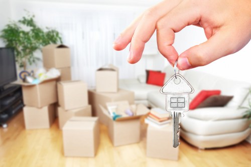 Packed moving boxes and furniture prepared for transport in Paddington