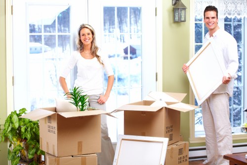 Careful handling of household items by Paddington man and van movers